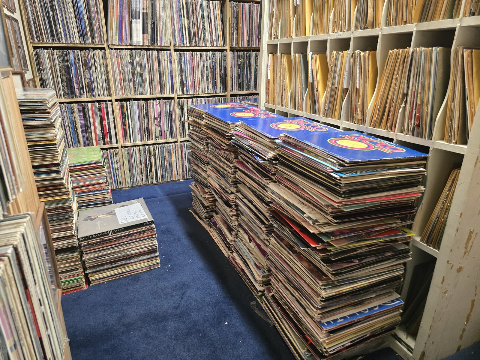 Stacks and shelves of records at Wax Trax Records